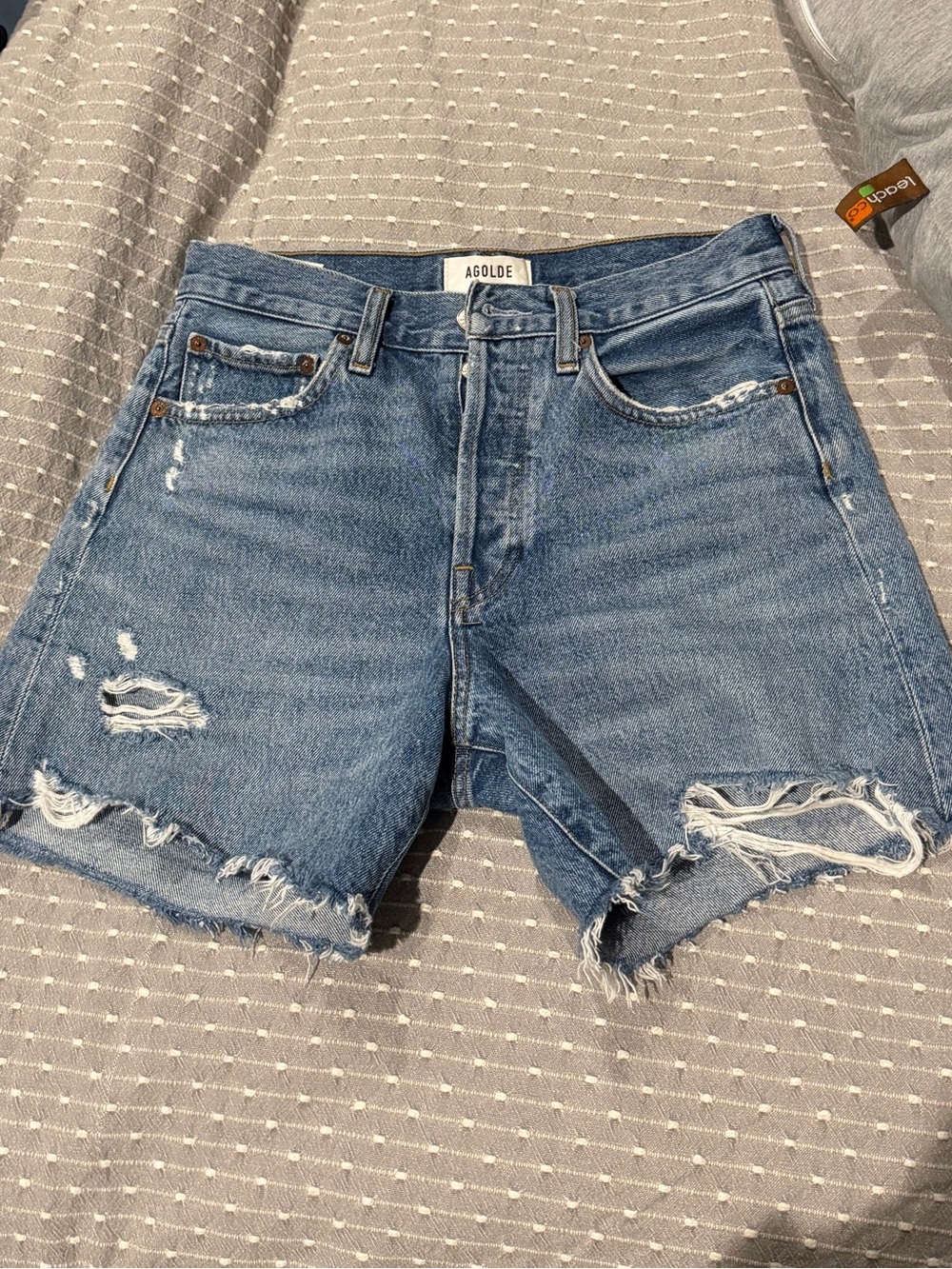 Agolde Medium Wash Distressed Denim Shorts